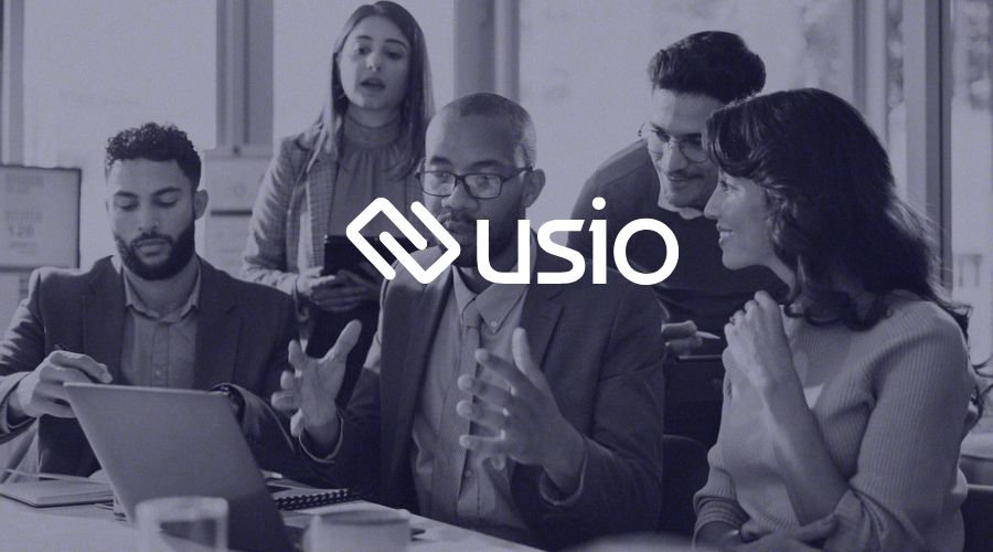 Team meeting on Usio vs. Stripe Connect alternative comparison for SaaS payment platforms